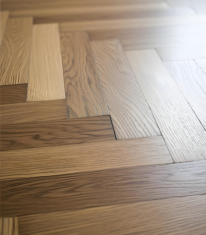 Détail de parquet bois avec assemblage soigné, rendu élégant et durable pour l’habitat
