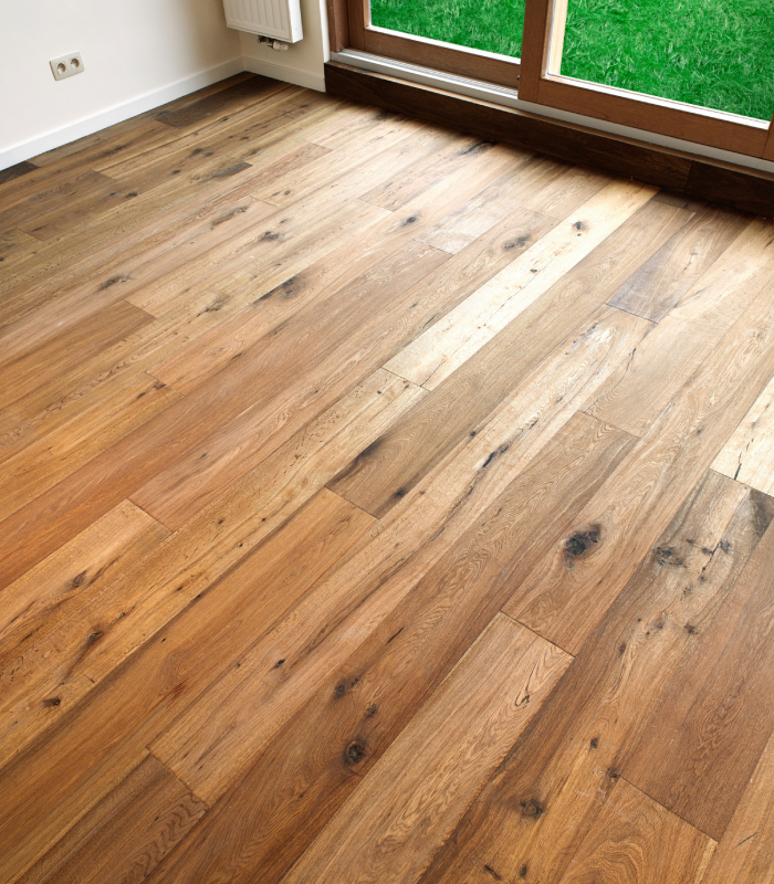 Parquet bois intérieur en lames larges, finition naturelle pour un sol chaleureux – Établissements Bottarel Hervé & Fils